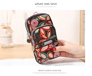 Detailed view of vintage floral three-layer zipper phone pouch with splash-proof nylon