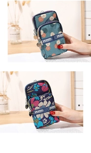 Detail of waterproof floral phone pouch with double zipper layers and fashion wrist strap