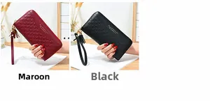 Close-up of burgundy and black long zipper wallets with heart texture and tassel