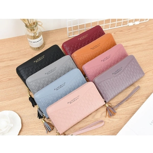 Detailed arrangement of luxury-style long zipper wallets in eight vibrant colors on wood