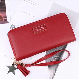 Red pebbled leather long wallet with U-zipper closure and star tassel wristlet charm