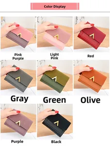 Close-up showing various colors of women's frosted short wallets with metal V-clasp detail