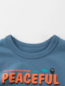 Blue cotton short sleeve T-shirt with peaceful nature graphic and crew neck detail