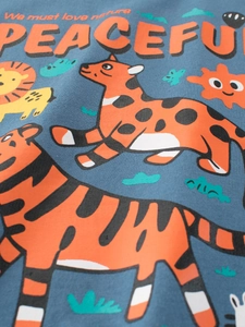 Navy blue kids cotton t-shirt featuring colorful cartoon jungle animals and nature text
