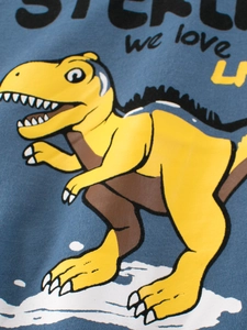 Kids navy t-shirt featuring a bright yellow dinosaur print and we love lettering