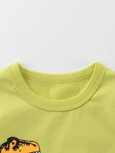 T-shirt enfant vert néon en coton avec col rond côtelé et imprimé dinosaure