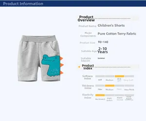 Detail of grey cotton French Terry shorts featuring a blue cartoon crocodile print