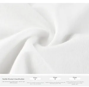 Close-up of white soft cotton knit fabric for kids t-shirt with textile quality details