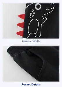 Detail of kids black shorts featuring 3D red dinosaur fins and functional side pockets