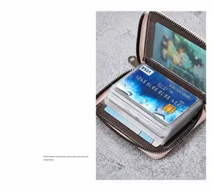 Detail view of pink multi-slot accordion card wallet with smooth metal zipper and gray lining