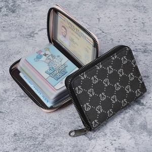 Litchi pattern leather accordion card holder with zipper and multiple slots in black
