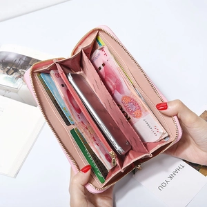 Pink zip-around long wallet with multiple card slots and large phone compartment