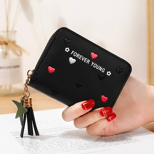 Black pebbled leather zip wallet for women with colorful heart embroidery and star tassel