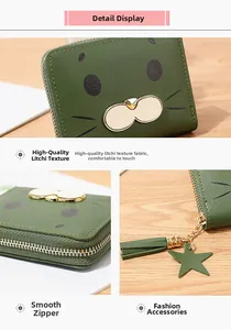 Detail display of dark green short wallet with lychee grain texture and cat face design