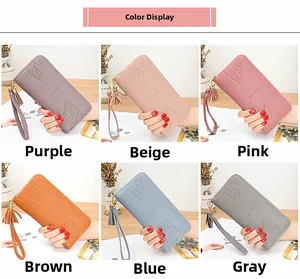 Detailed color display of long zip wallets featuring maple leaf tassels and lychee texture