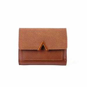 Women's vintage brown bifold wallet with matte suede texture and gold V-metal buckle