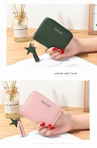 Close-up of minimalist square wallets with star tassel zipper and litchi texture