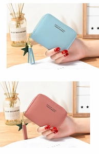 Detail of Korean style mini square wallets with zipper tassel and star pendant charms
