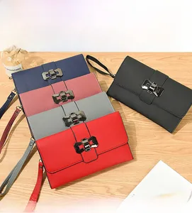 Litchi pattern faux leather wallets with bow metal buckles and wrist straps