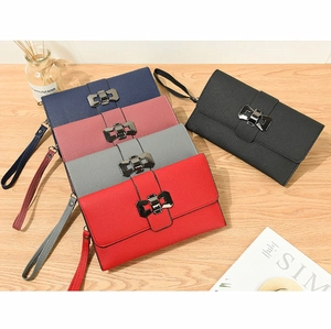 Detail of multi-color litchi grain long wallets with bow metal clasp and wrist strap
