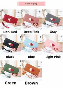 Detailed view of long PU leather zip wallets in eight pastel colors with heart patches
