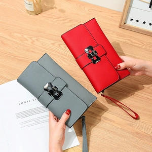 Litchi pattern leather long wallets in red and dark grey with metal clasp and wrist strap