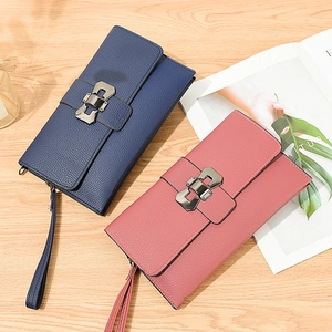 Lychee pattern cross-body shoulder bags in navy blue and pink with metal buckle and wrist strap