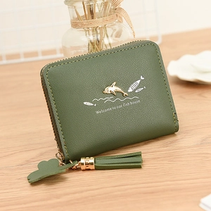 Green faux leather women's zip wallet with cute dolphin print and tassel charm