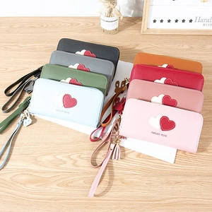 Multi-color long leather wallets for women featuring heart patterns and wrist straps
