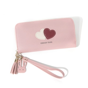 Pink long zip-around wallet with heart stitching and tassel wristlet for women