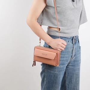 Fashion peach pink PU leather crossbody bag with multiple zippers and golden hardware