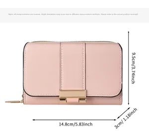 Detail view of pink women's wallet with gold metal buckle and size dimensions