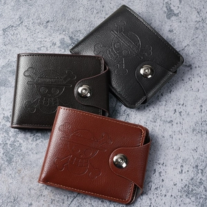 Three men's bifold wallets with One Piece pirate skull embossing in black and brown