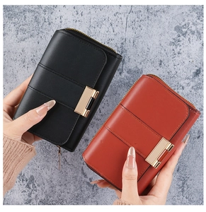Short leather wallets for women in black and brown with gold zippers and square buckles