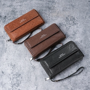 Men's large capacity business clutches in black and brown leather with wrist straps