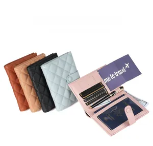 Interior detail of faux leather passport holder showing card slots and storage pockets
