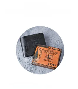 Detail of bifold PU leather wallet featuring a 100 dollar bill embossed pattern design