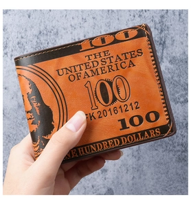 Detail of creative double-fold men's wallet with textured 100 USD bill pattern