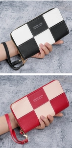 Detail of checkered patchwork long wallets in black and red with wristlet straps