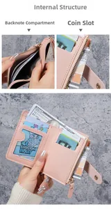 Detail view of pink fold wallet showing multiple card slots and a clear ID window