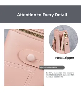 Detail of pink PU leather wallet with textured litchi grain and gold metal zipper