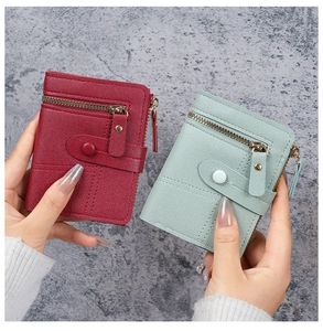 Short women wallets in red and mint green with lychee texture and snap button closure