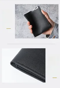 Close-up of the ultra-thin black wallet showing flexible texture and reinforced edges