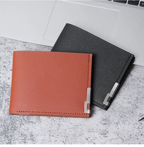 Classic men's bi-fold short wallets in brown and black leather with metal corner decor