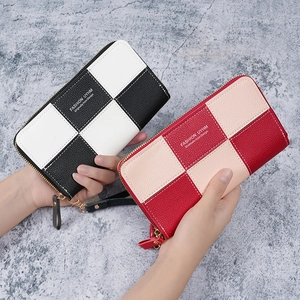 Checkerboard pattern long zip around wallet in pebble leather with wristlet strap