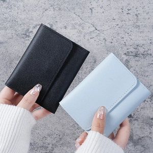 Minimalist tri-fold women's slim wallets in black and light blue PU leather