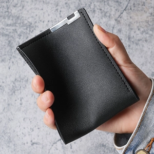 Men's minimalist black leather wallet with silver metal clip and fine litchi texture
