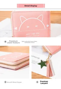 Pink cat theme wallet featuring star charm, fringe tassel and textured lychee pattern