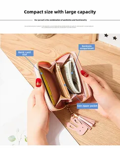 Pink PU leather short zipper wallet interior with card slots and rabbit charm detail