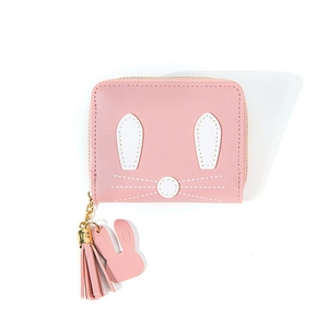 Pink PU leather rabbit coin purse with tassel and metal zipper on white background